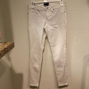 White Bebe Skinny Jeans with Bebe Print